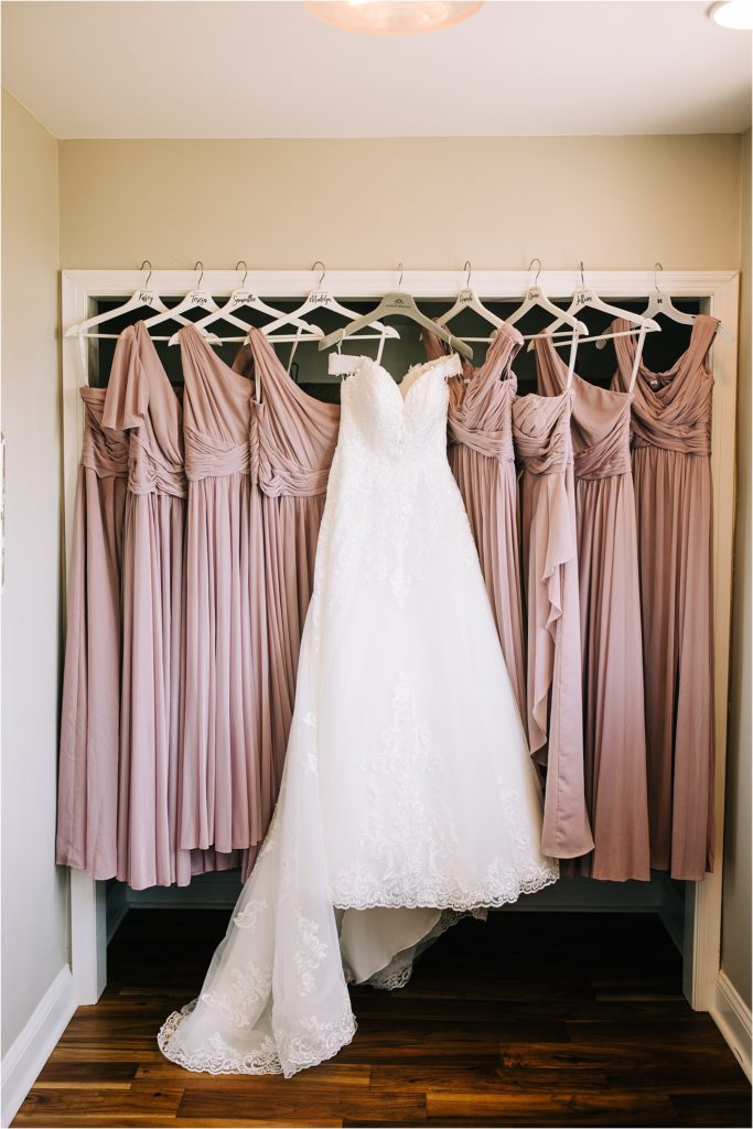 wedding dress with pink bridesmaids dresses