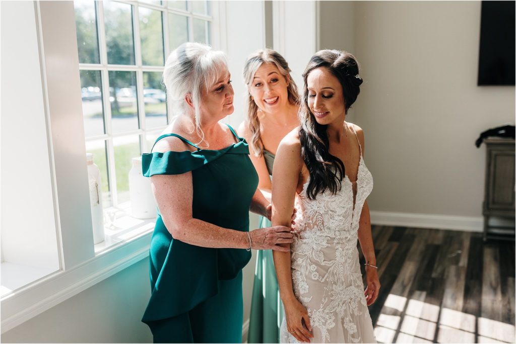 bride getting ready at the grove at centerton